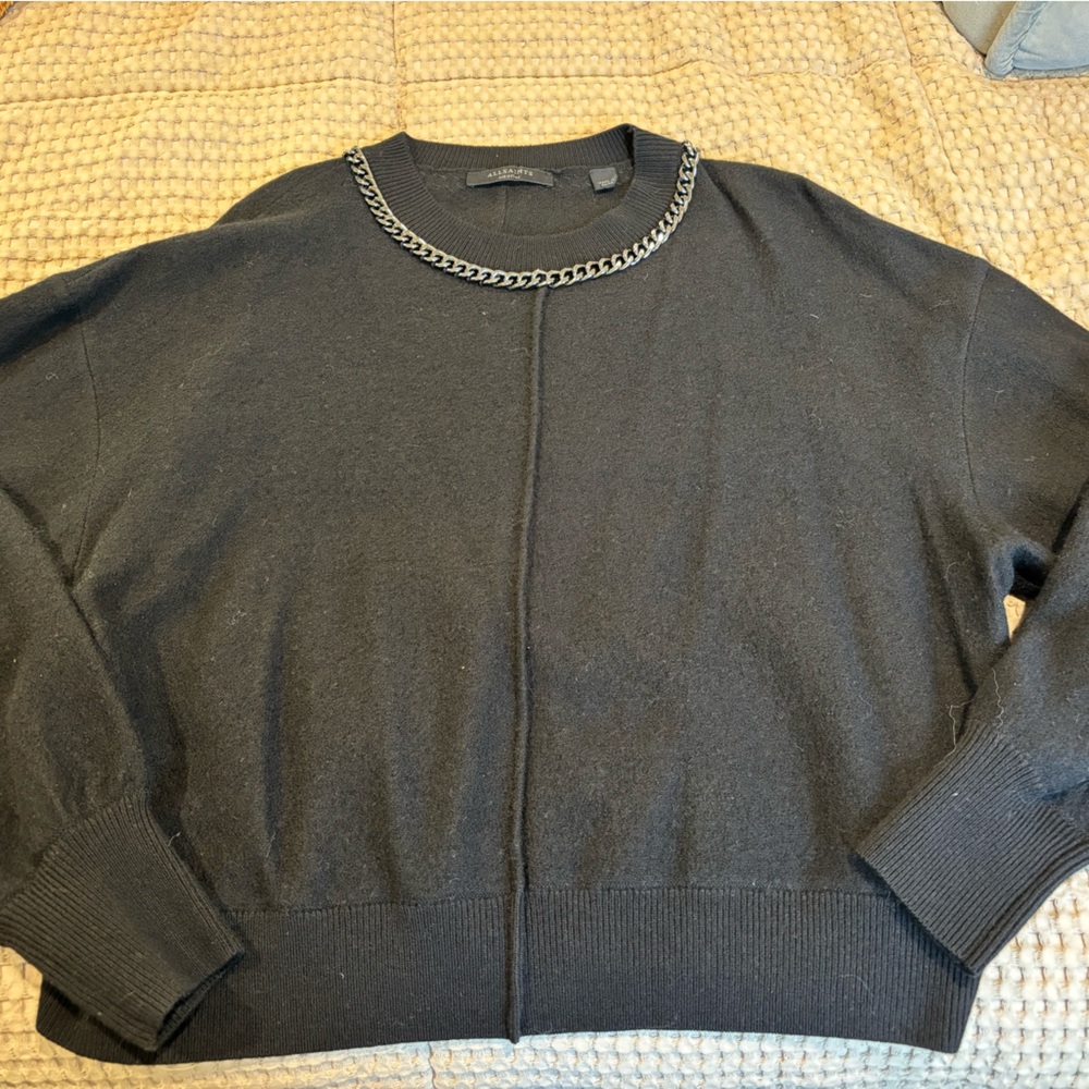 All saints sweater with chrome metal  neckline detail 
Size medium